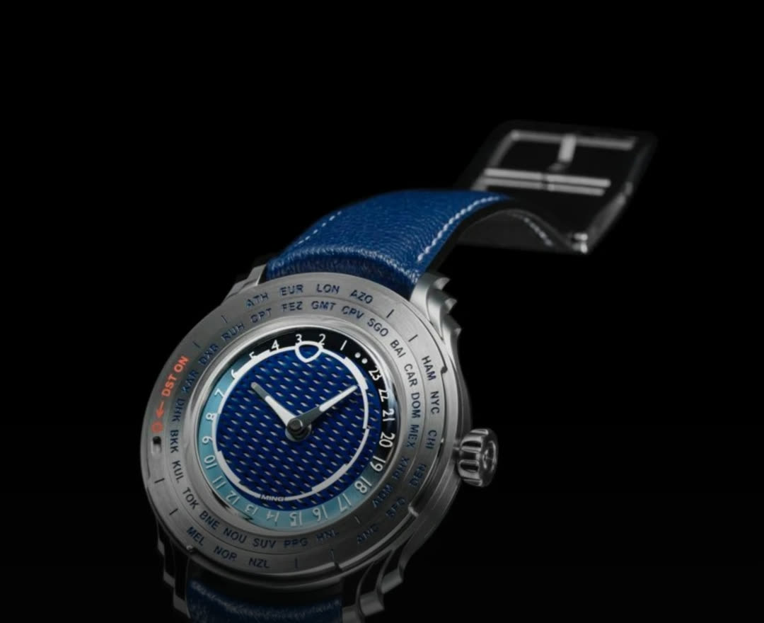 Ming 57.05 Comet world-timer with blue dial and daylight-saving bezel