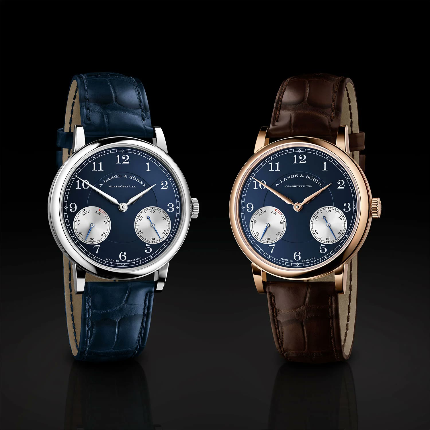 Two A. Lange & Söhne 1815 Up/Down watches in white gold and pink gold with blue dials
