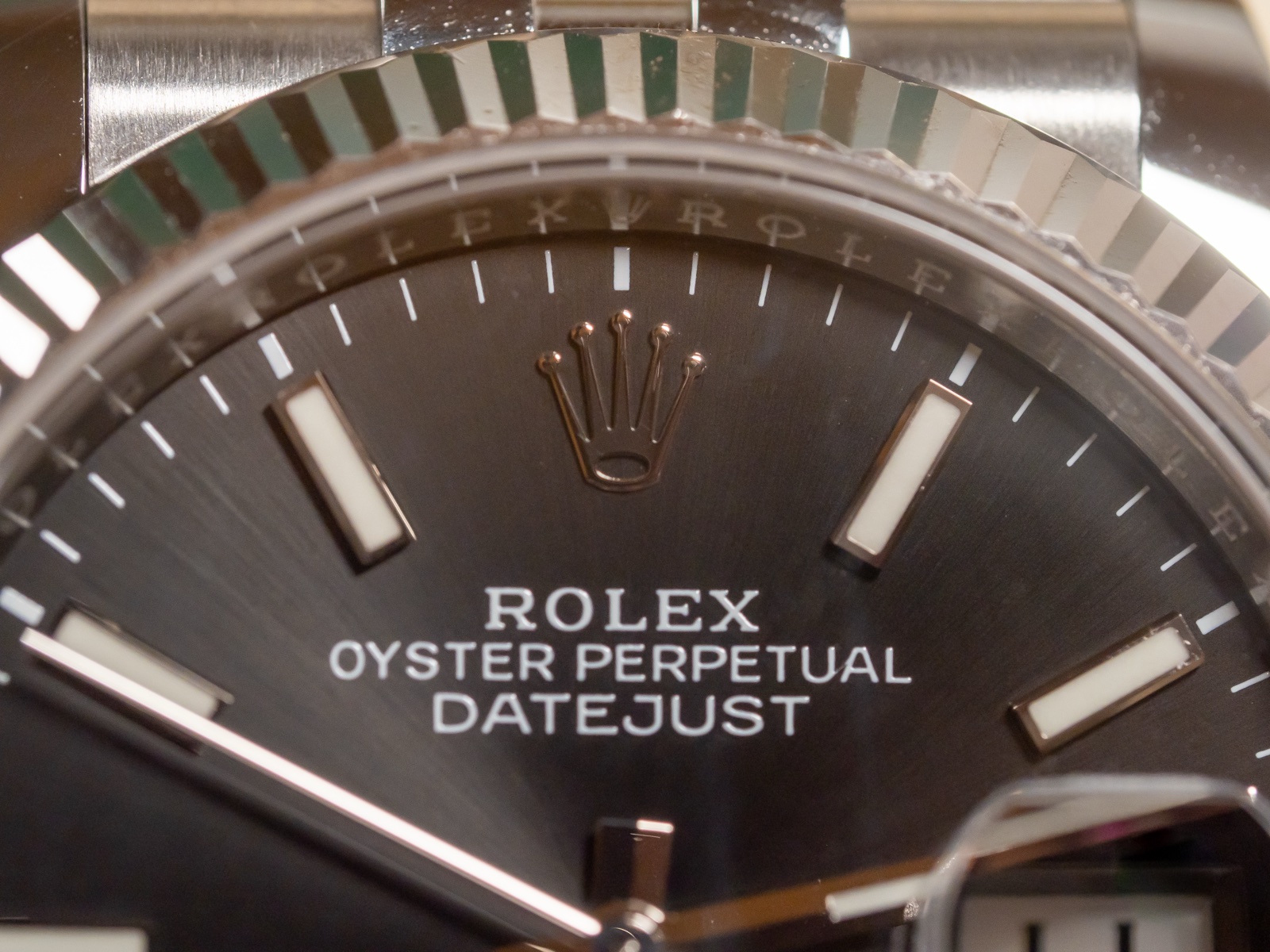 Real Rolex Datejust 36 rehaut with laser-etched ROLEX text around the dial
